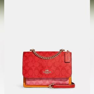 Coach Klare Crossbody in Blocked Signature Canvas.